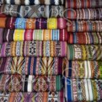 Some of the vibrant colours and designs. Made by hand using natural ingredients. Chincheros Cusco Peru.